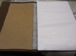 Fold the edges of the book cloth around the cover and glue the back of the first page to the board.